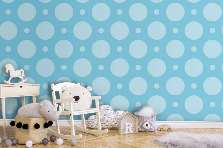 Polka dot wallpaper decoration for children in light blue.