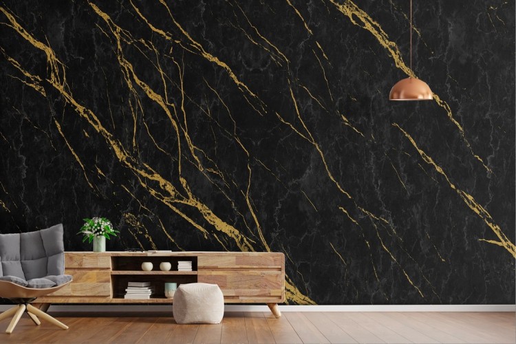 Black marble surface wallpaper with gold veins