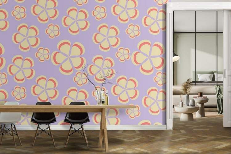 Wallpaper with stylized flowers with yellow and pink petals.