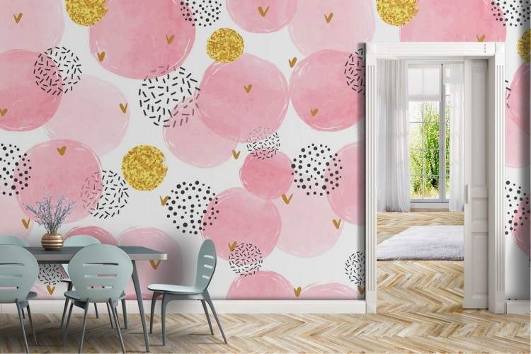 Abstract pink and gold polka dot wallpaper.